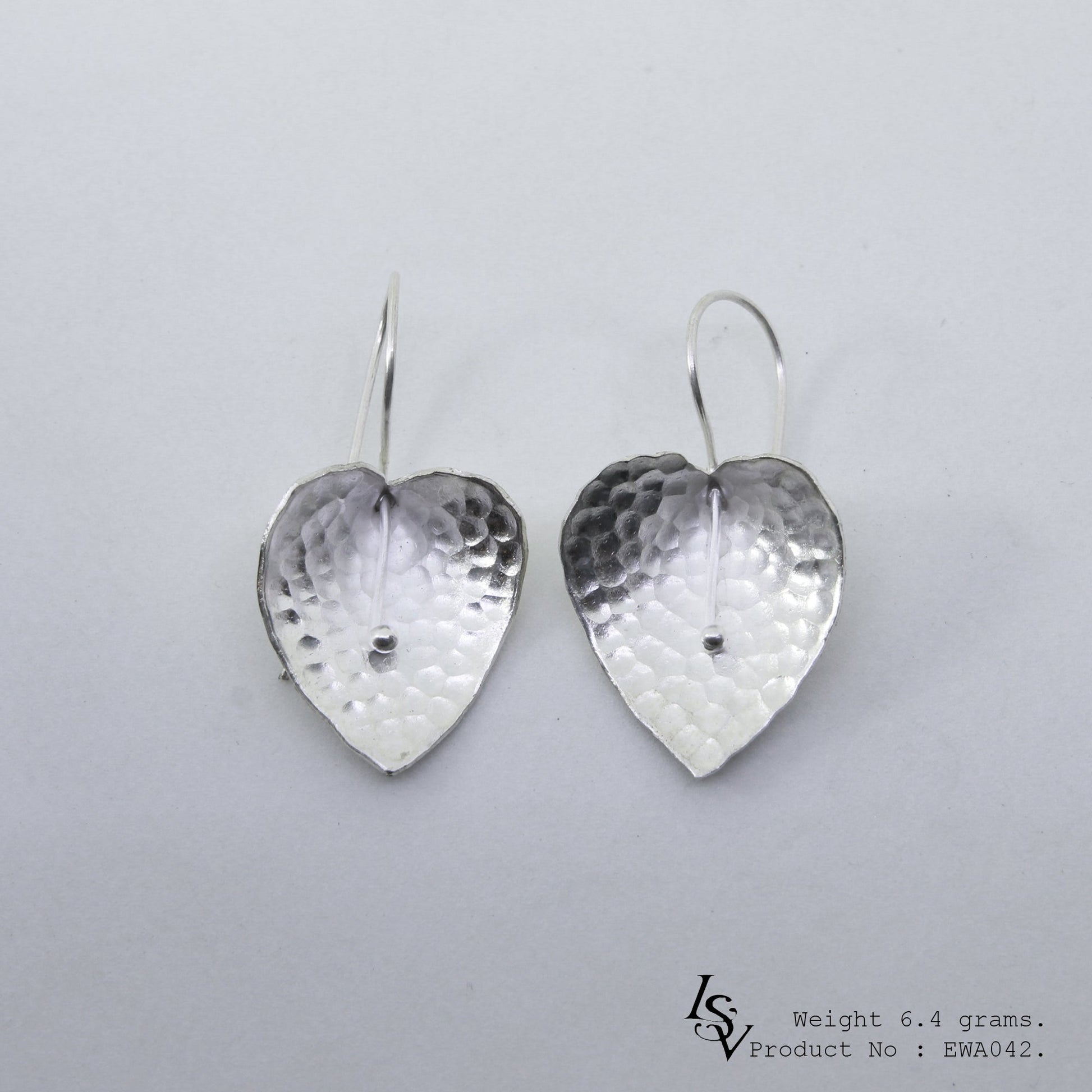 Floral magic in these handmade silver earrings.
