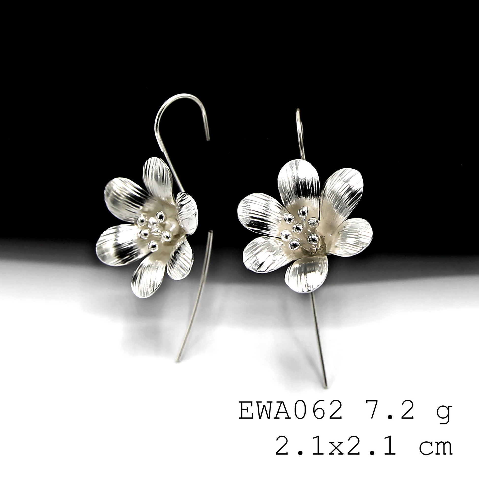 Timeless beauty in our handmade white flower silver earrings.