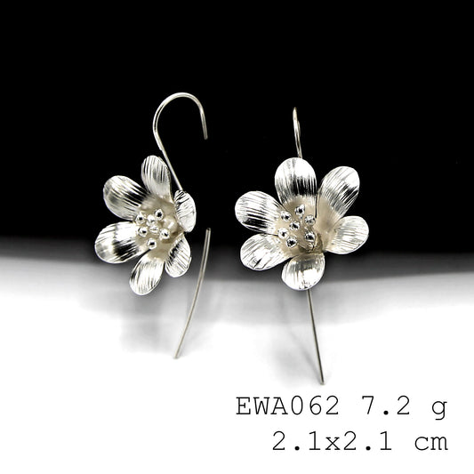 Timeless beauty in our handmade white flower silver earrings.
