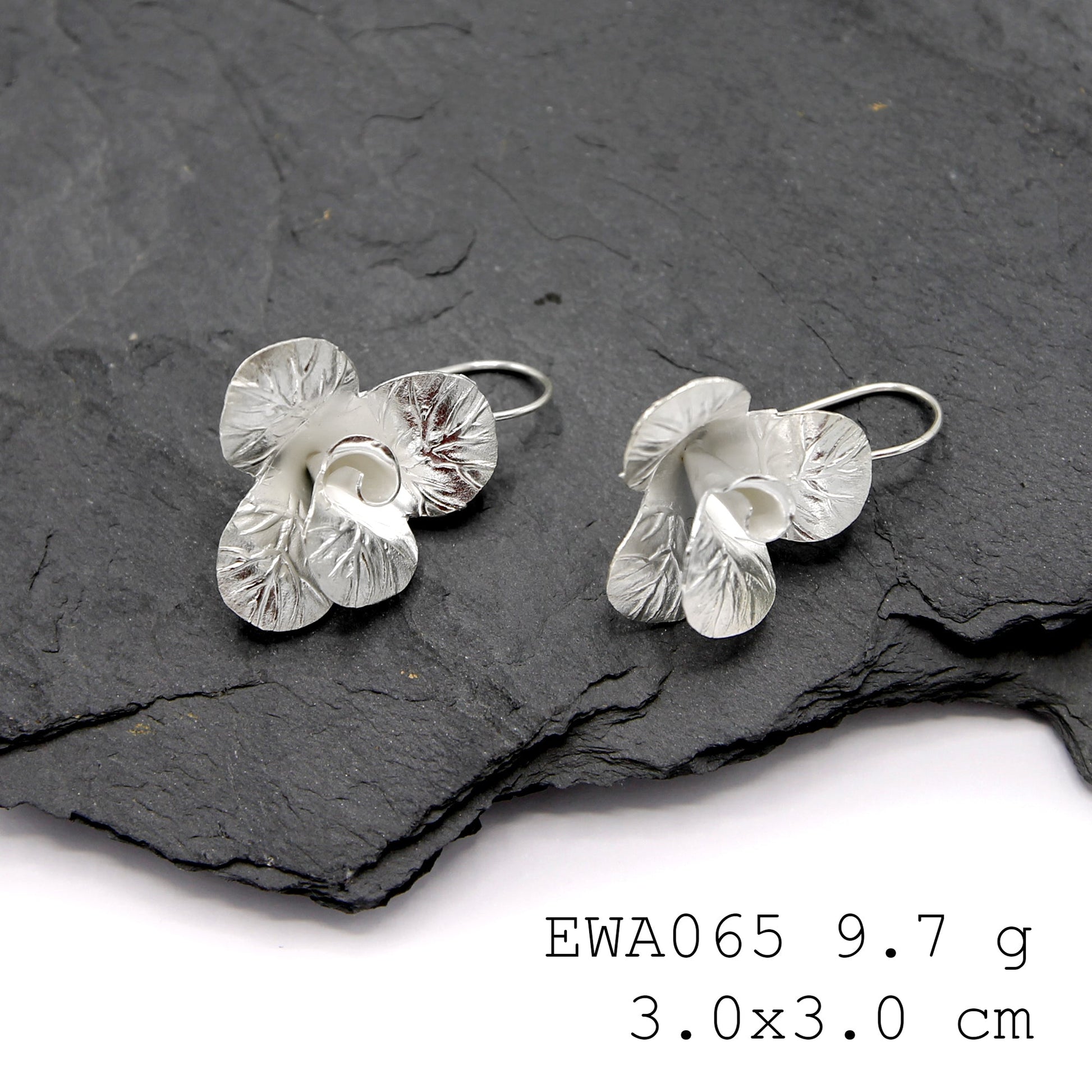 Bloom in style with our handmade silver earrings.