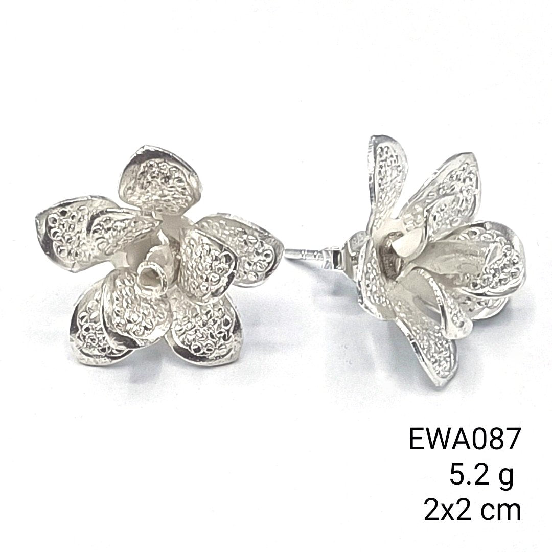 The flower that never fades. Shop our 98% silver earrings.