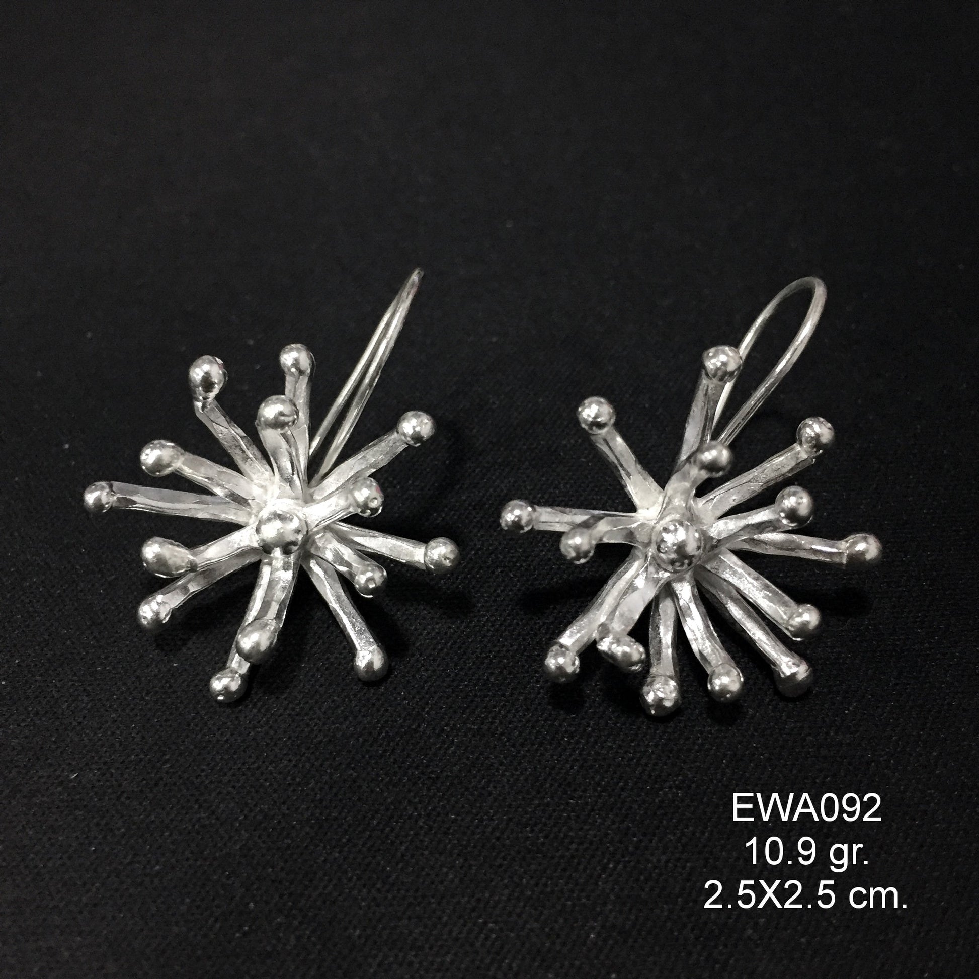 Purely floral. Shop our 98% silver earrings.