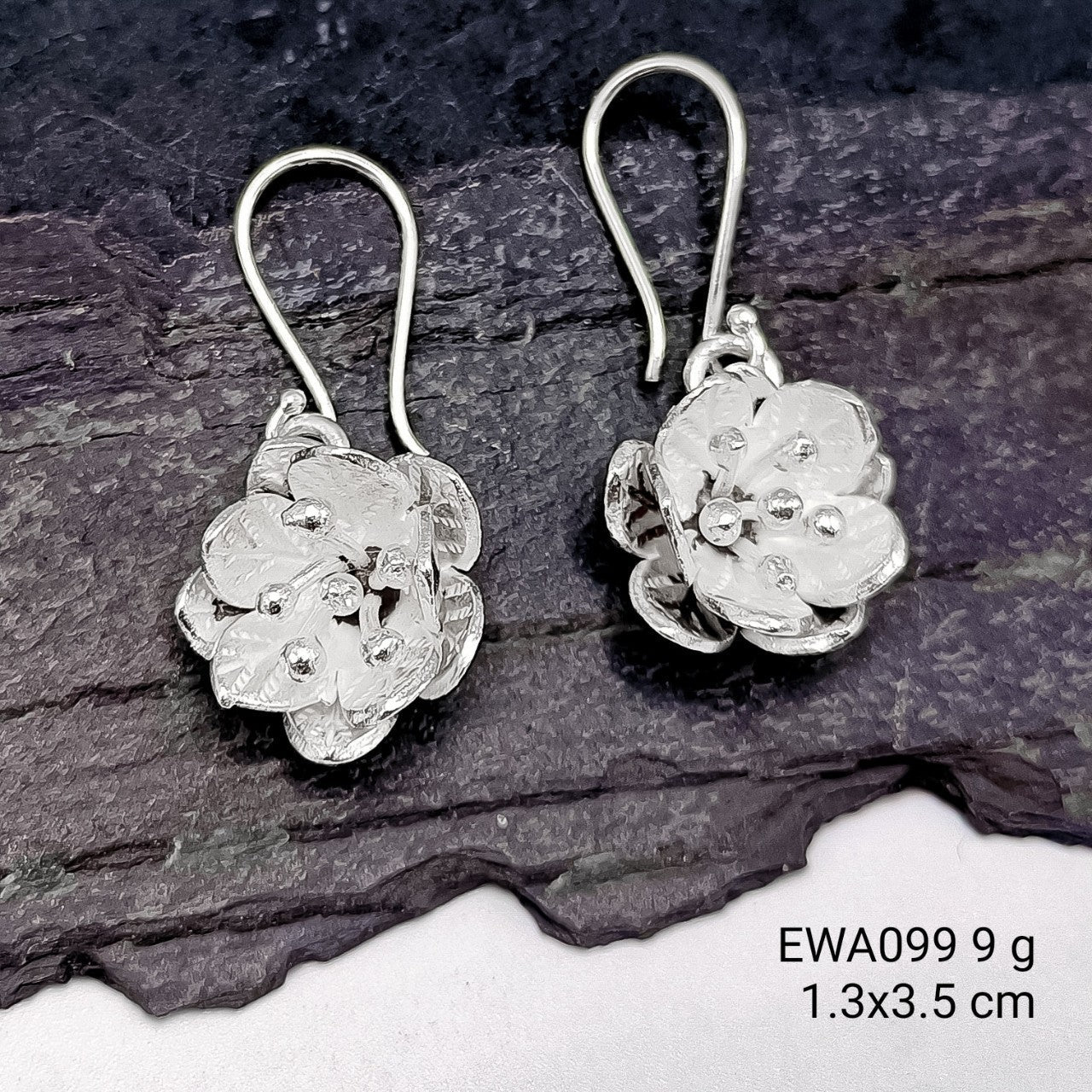 The gift of pure silver: Shop our floral silver earrings.