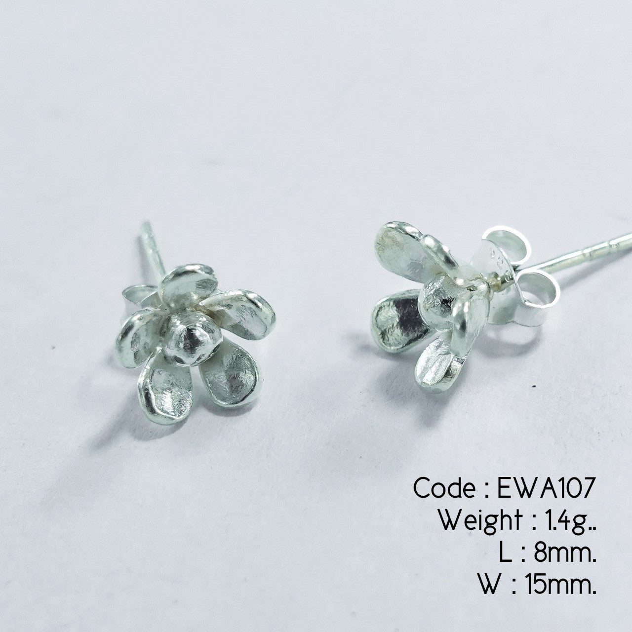 Almost sold out! Get your white flower silver earrings today.