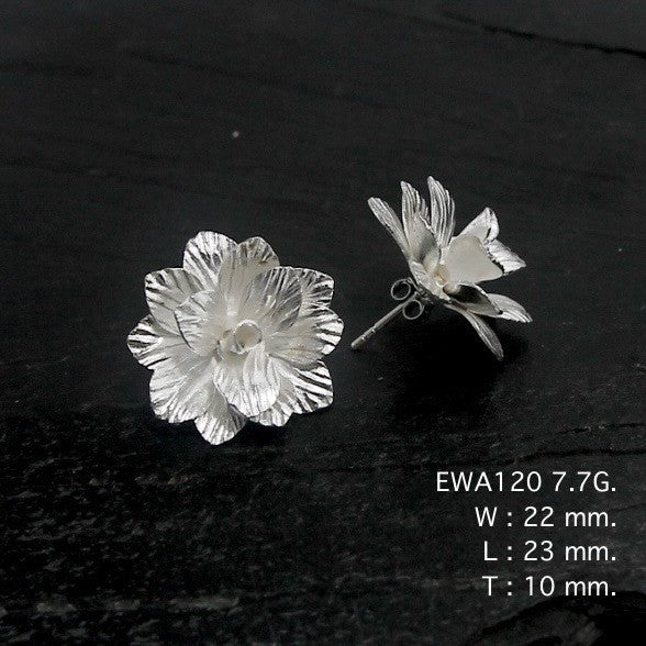 Obsessed with petals? You need these unique silver earrings.