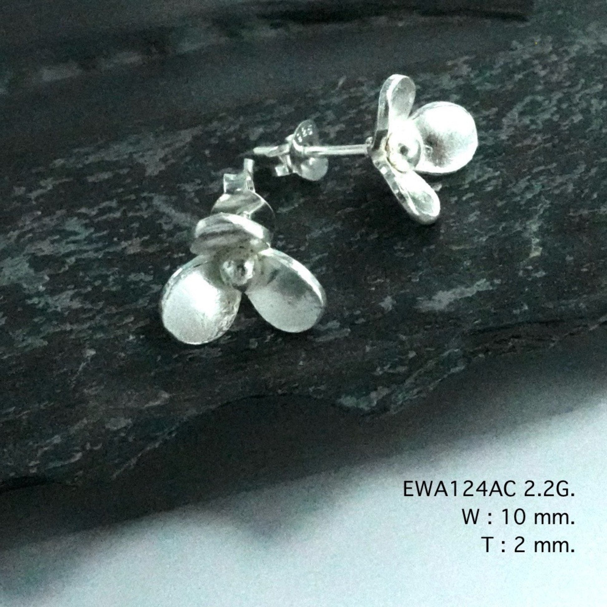 Pure, handmade, and floral. The perfect silver earrings.