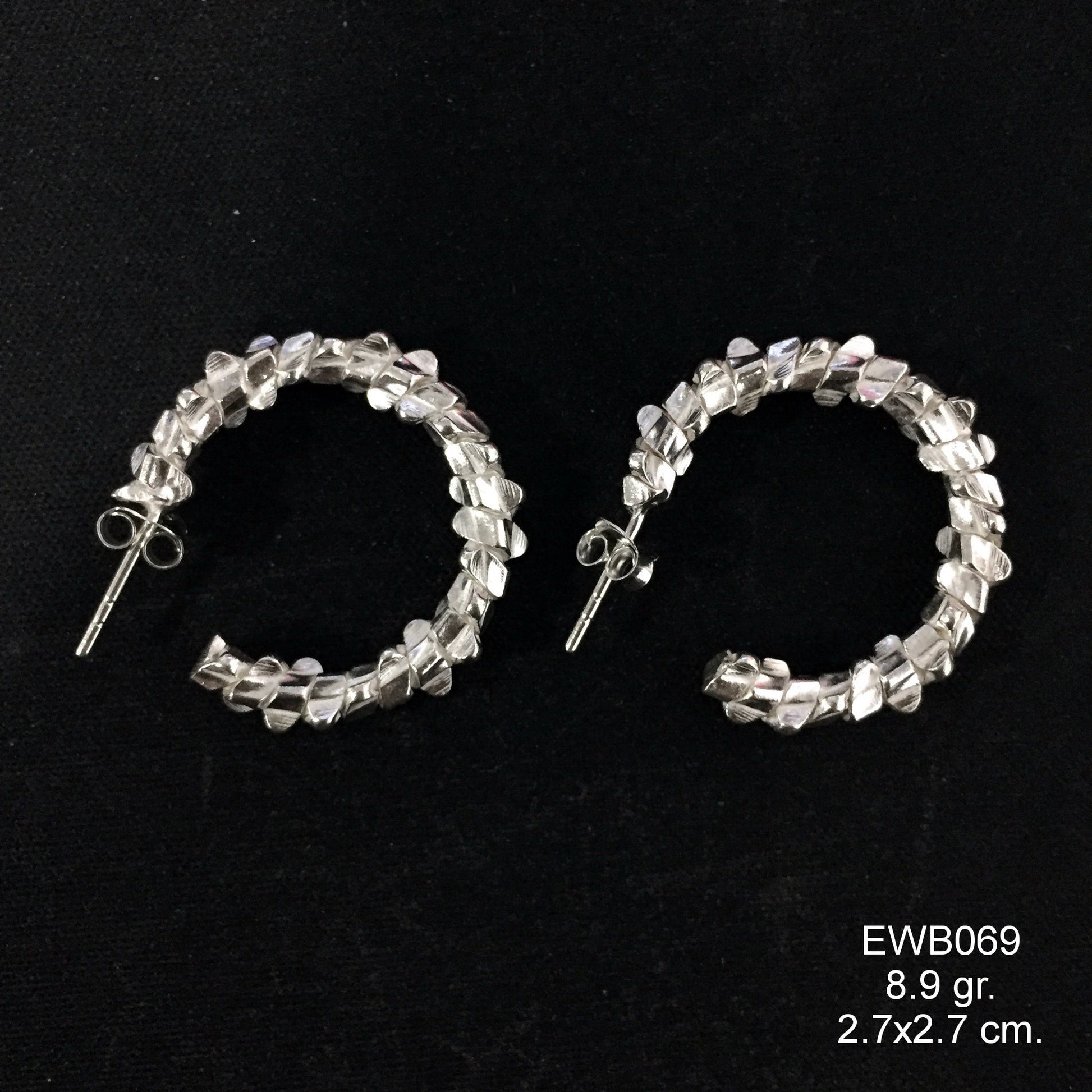 Beyond 925: Experience 98% pure white line snail silver earrings.