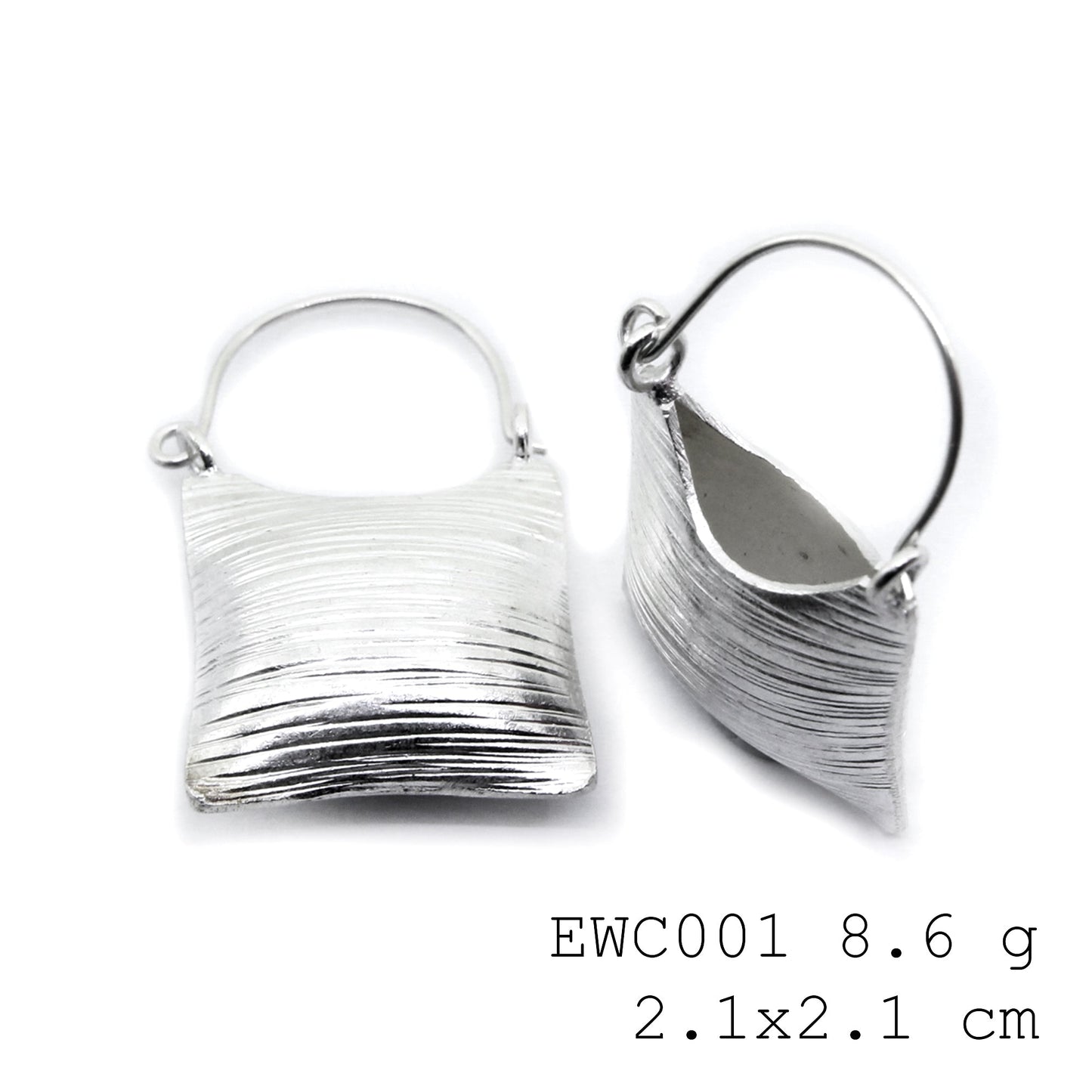 Pure 98% silver luxury in a unique bag shape: Shop silver earrings.