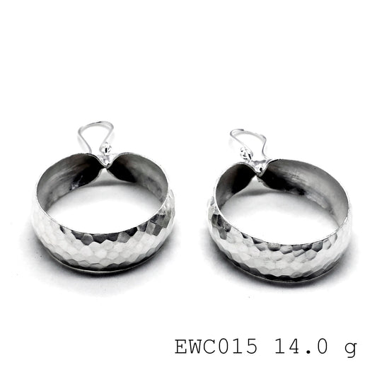 The "it" item of the season: Handmade bag shape silver earrings.