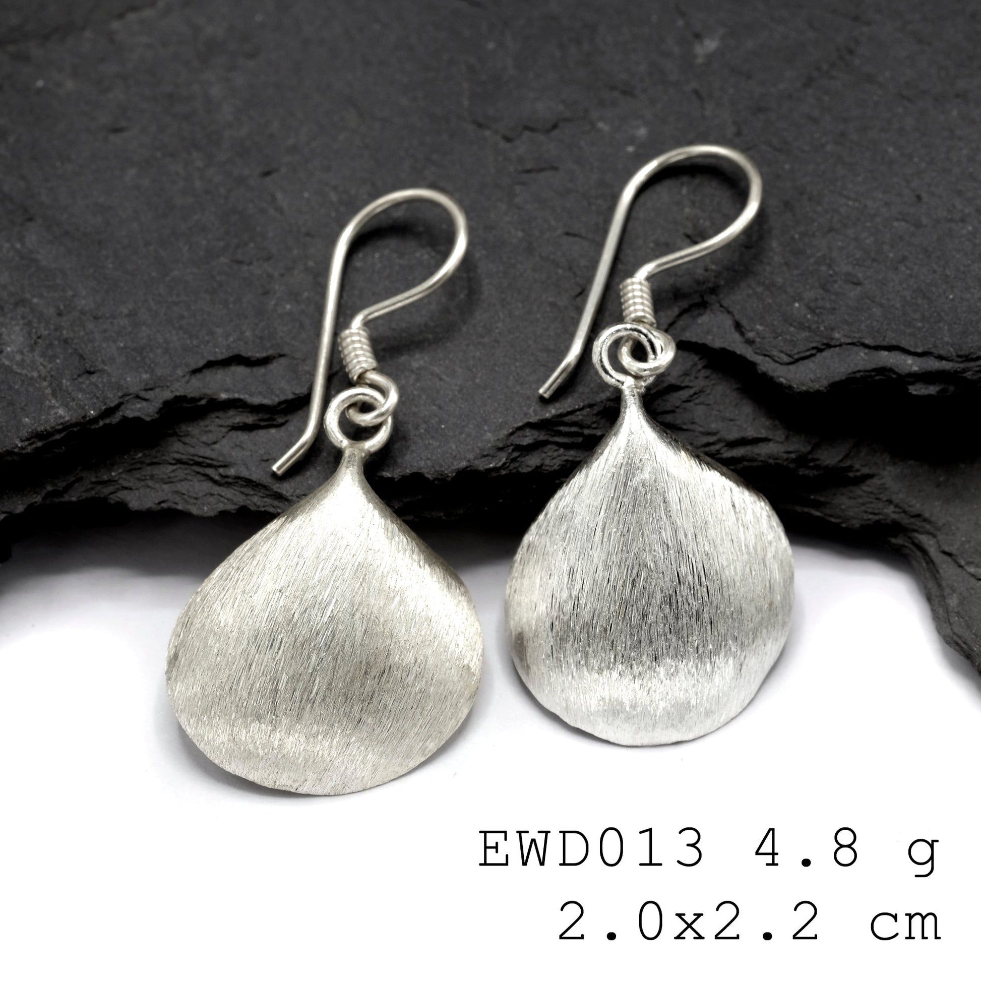 Pure silver perfection! Experience our 98% pure funnel silver earrings.
