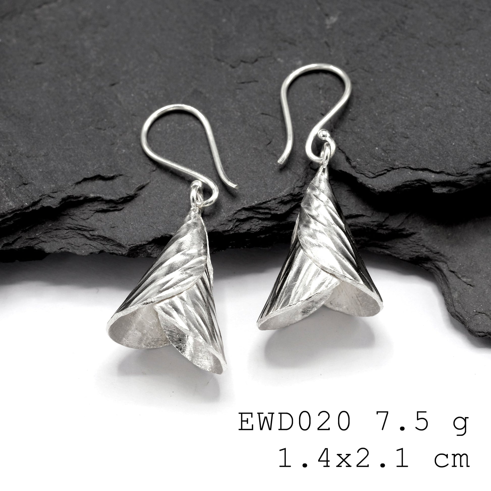 You won't find these anywhere else: Handmade funnel silver earrings.