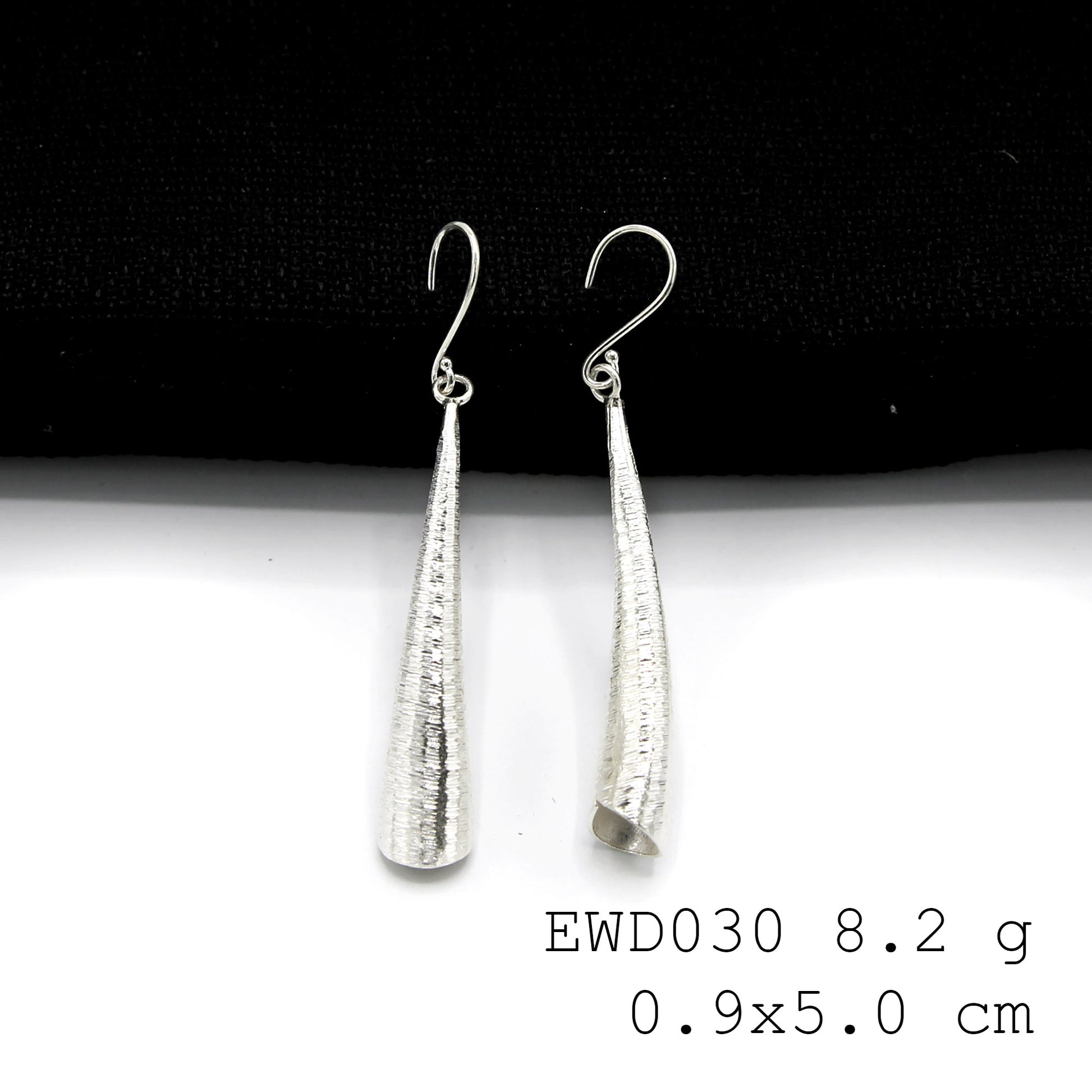 Hand-forged luxury! Grab these 98% pure white funnel silver earrings.