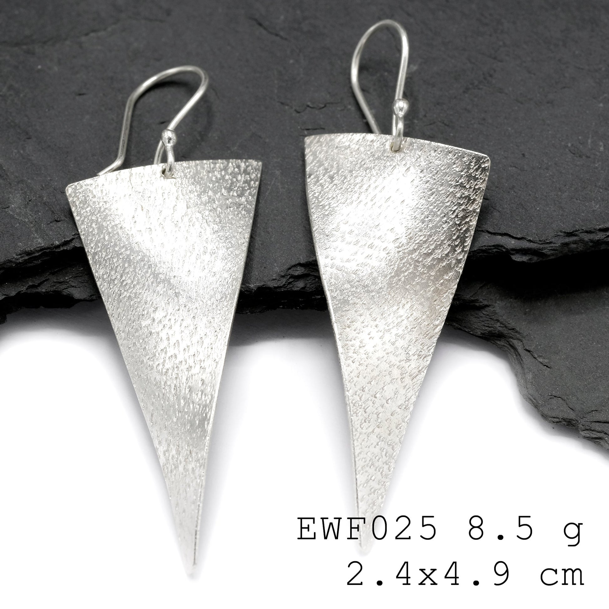 Handcrafted elegance in every pair of silver earrings.