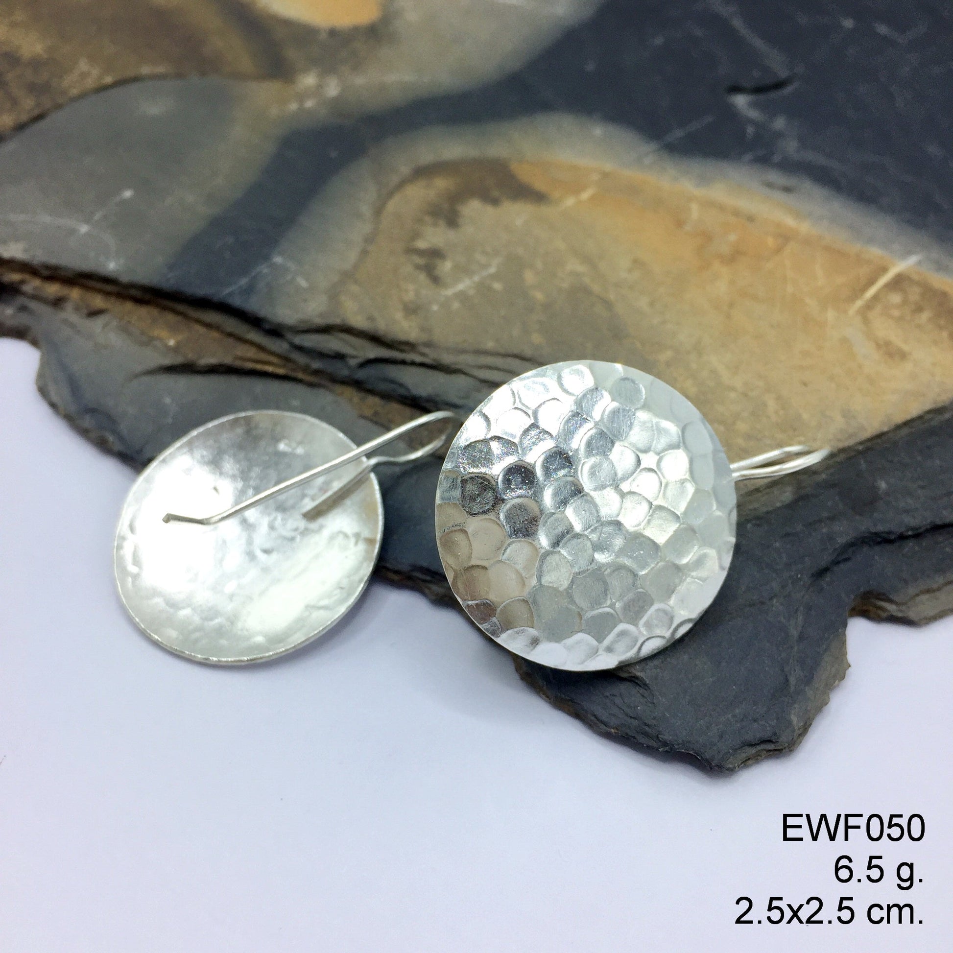 Limited edition 98% pure white sheet silver earrings.