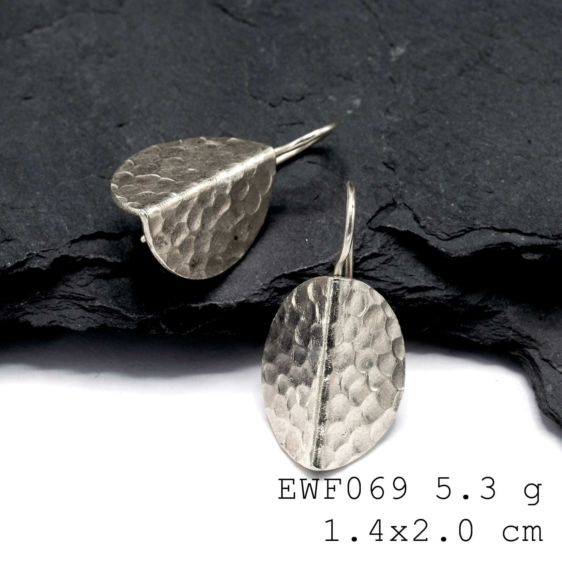 Pure silver vibes: White sheet silver earrings.