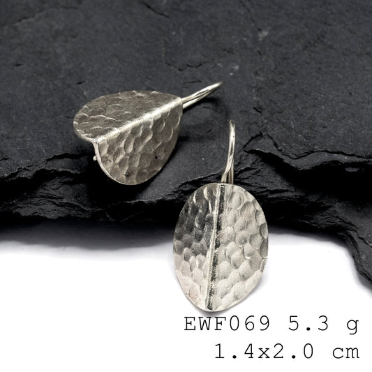 Pure silver vibes: White sheet silver earrings.