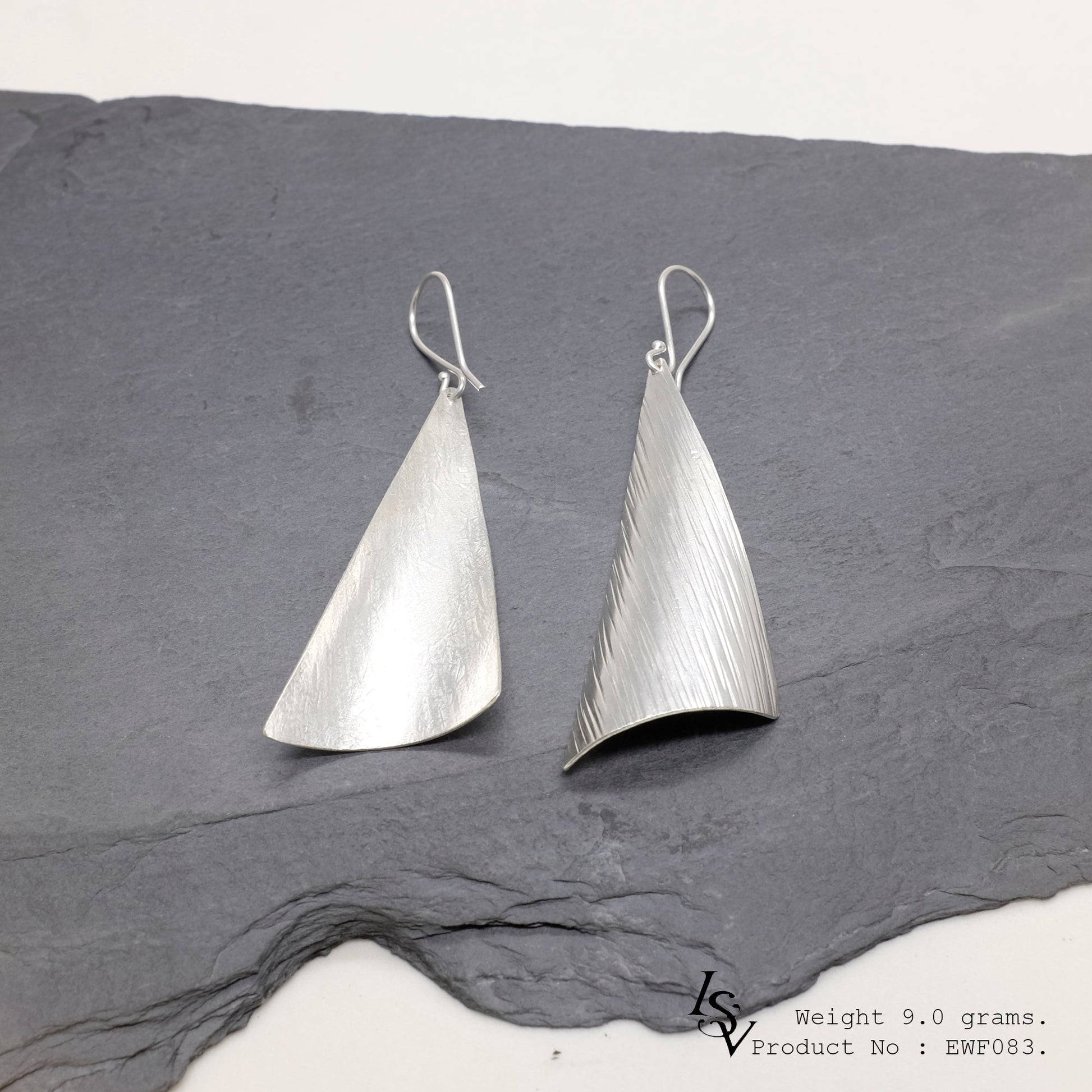 Simple, bold, and pure: Shop white sheet silver earrings.