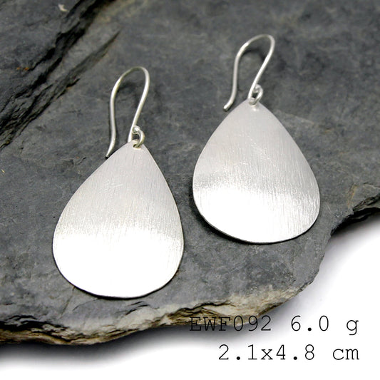 Handmade luxury: Get your white sheet silver earrings.