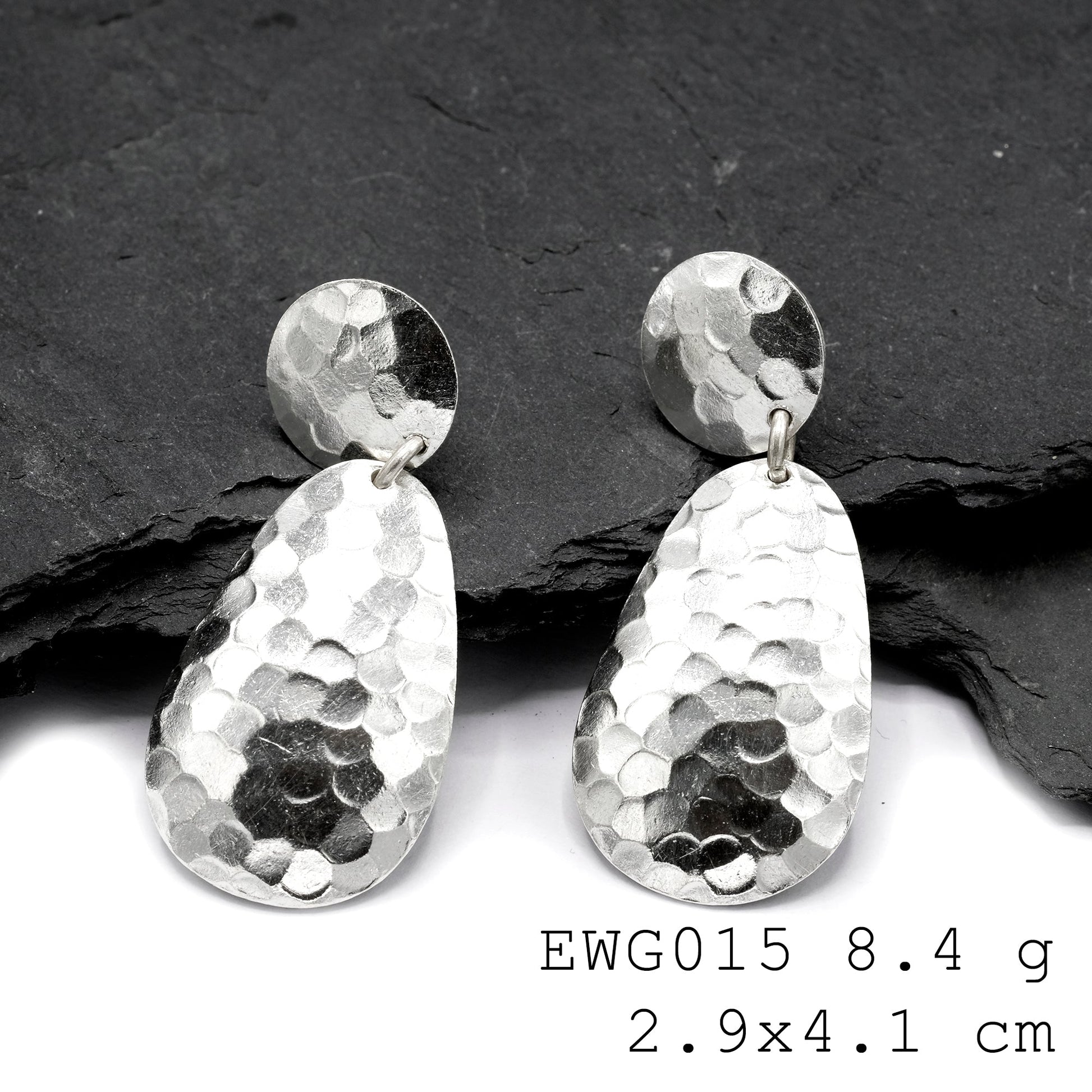 Artisan-made for the modern woman: Two-layer silver earrings.