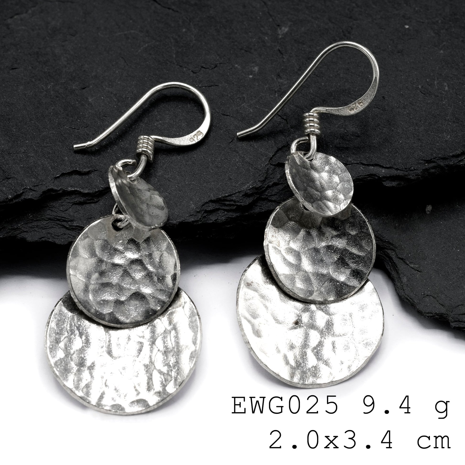 Double the luxury: Handmade two-layer silver earrings.