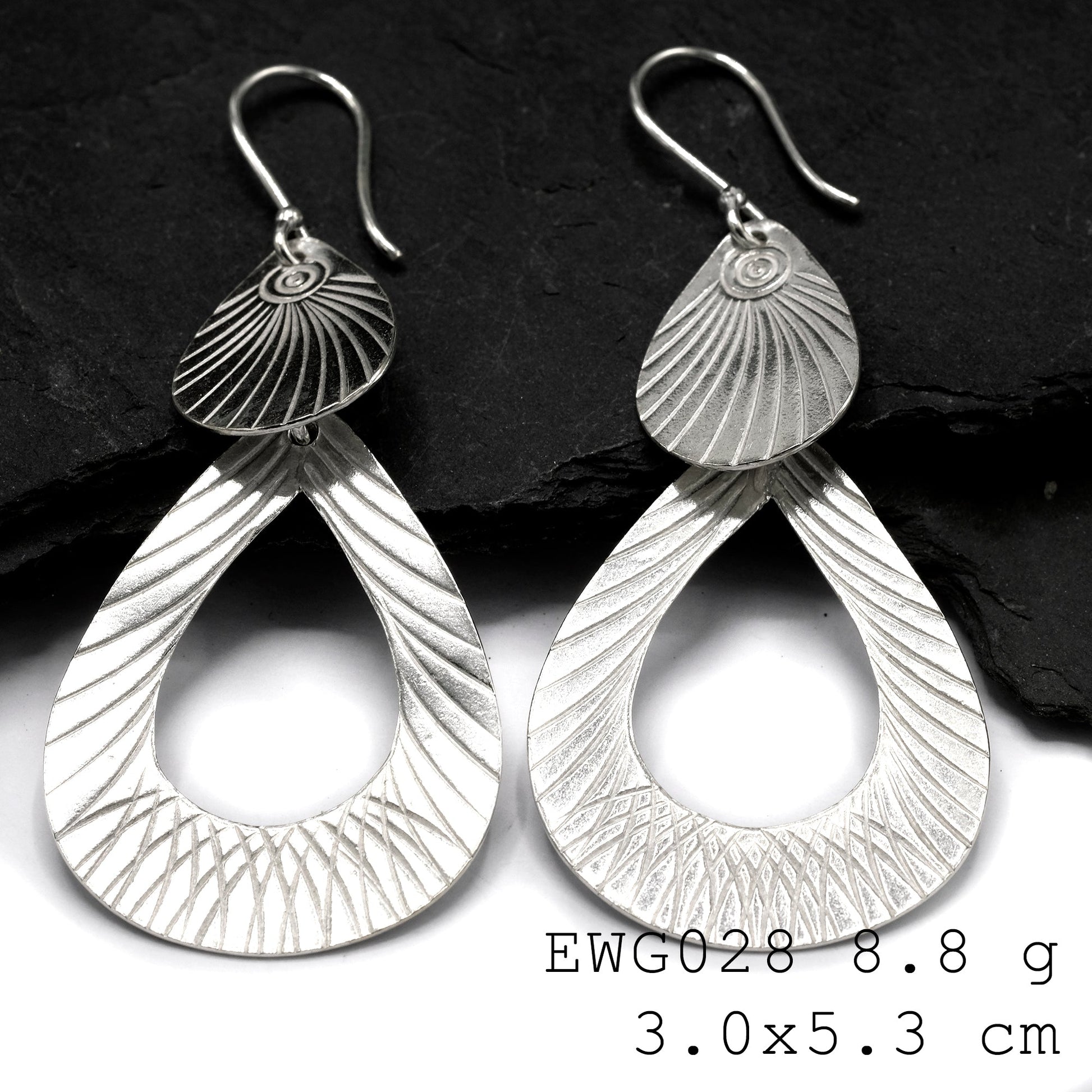 Minimalist yet bold: Shop our white two-layer silver earrings.