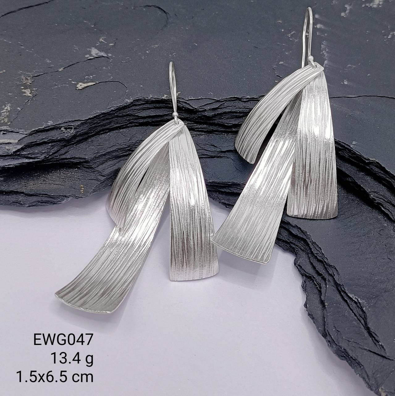 Selling fast! Get your handmade two-layer silver earrings now.