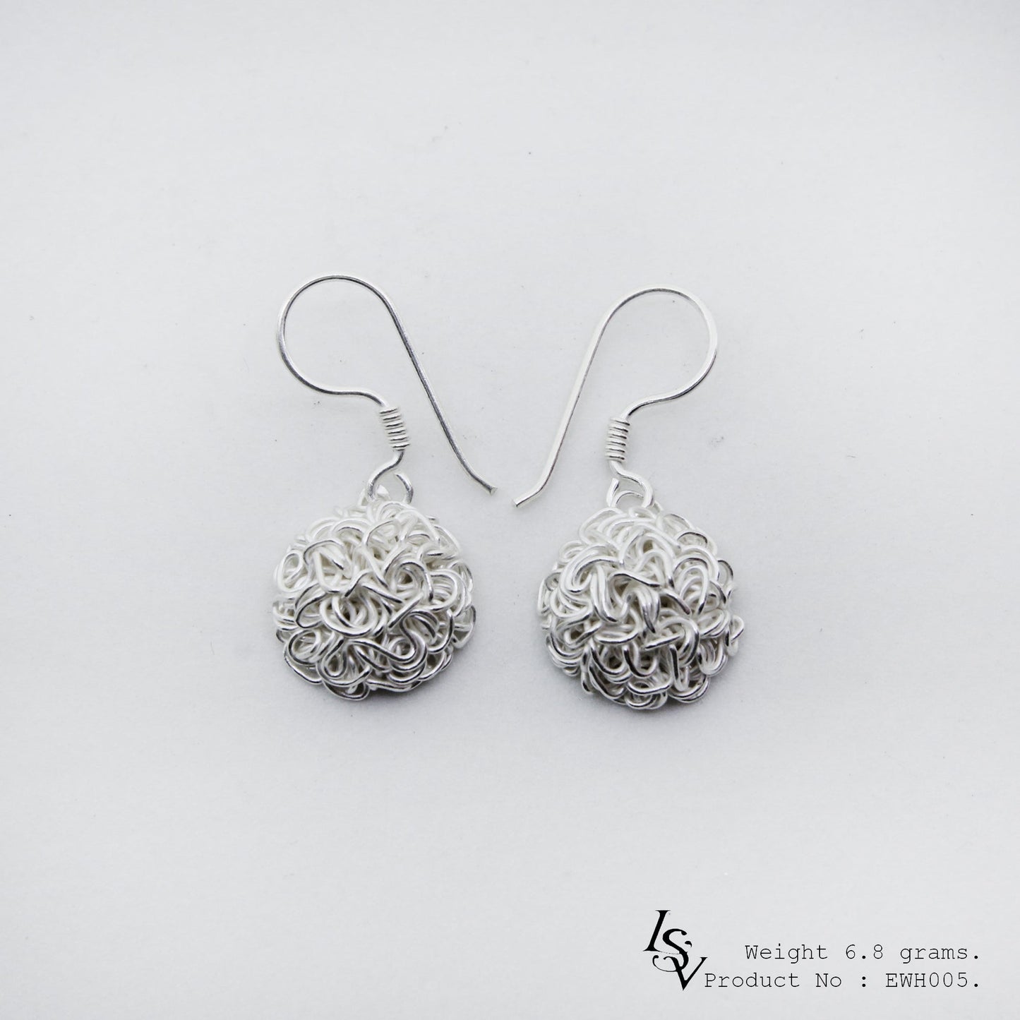 Artisan-crafted magic! Own these white bird's nest silver earrings today.