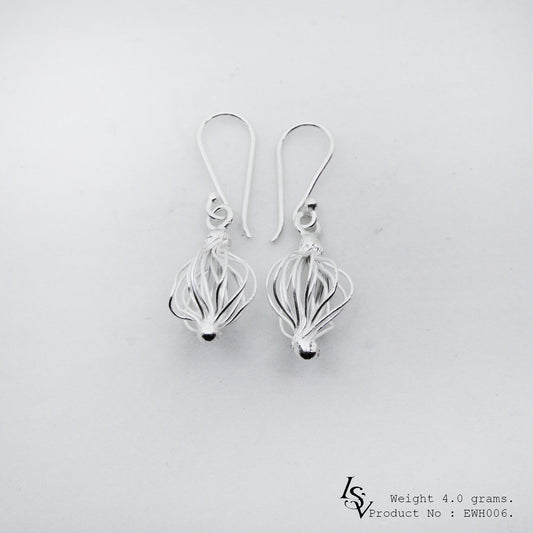 Detailed, delicate, and 98% pure: Shop our bird's nest silver earrings.