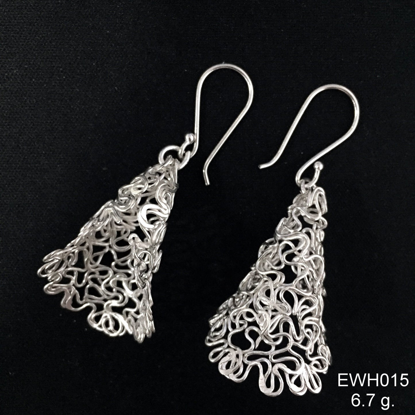 Stop scrolling for these one-of-a-kind handmade bird's nest silver earrings.