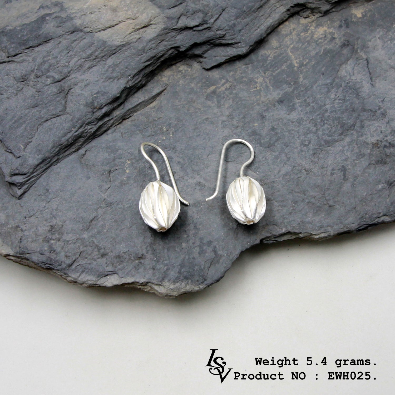 The ultimate conversation starter: Handmade white bird's nest silver earrings.