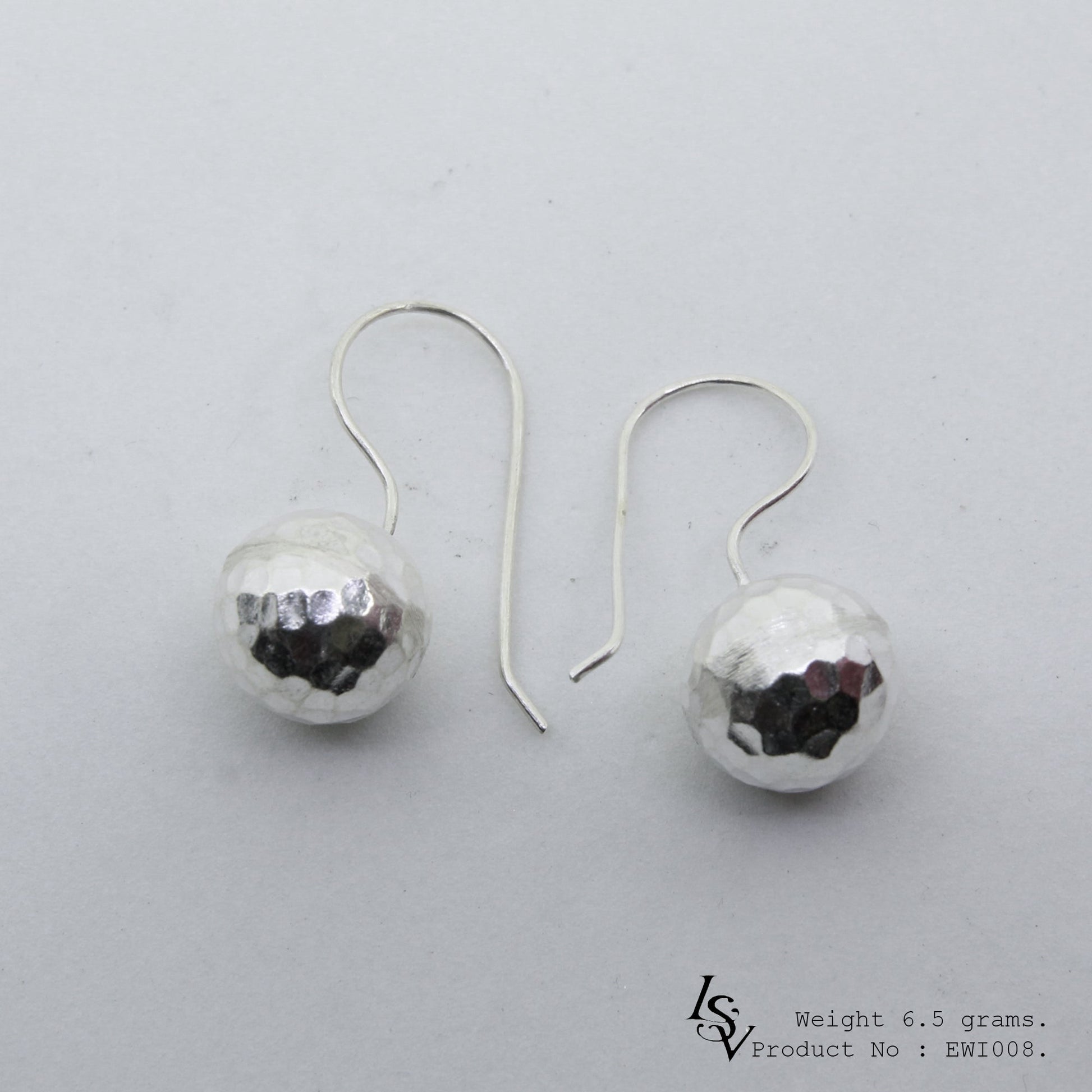 Selling out fast! Grab these white ball shape silver earrings.