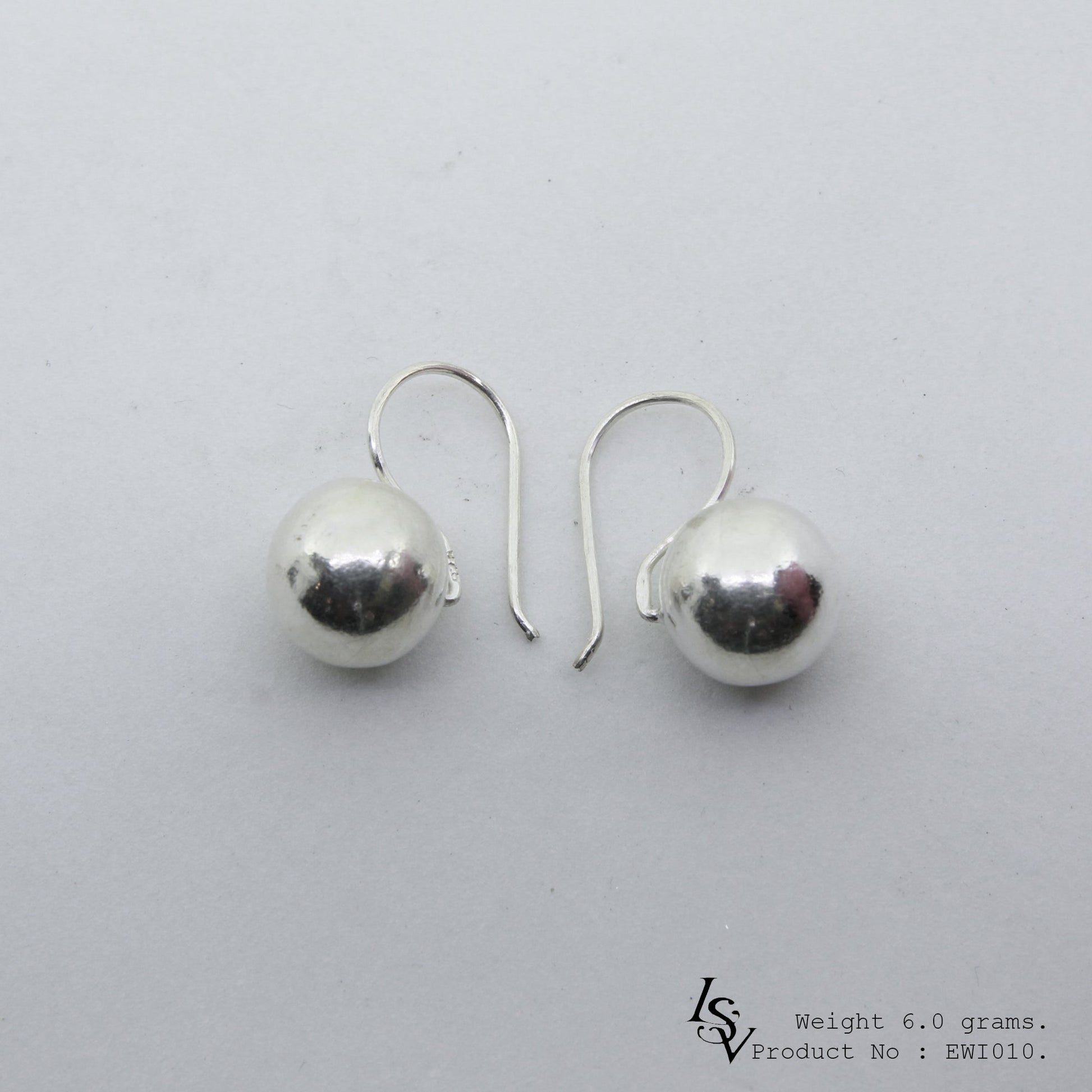 Final stock alert! Shop our white ball shape silver earrings.