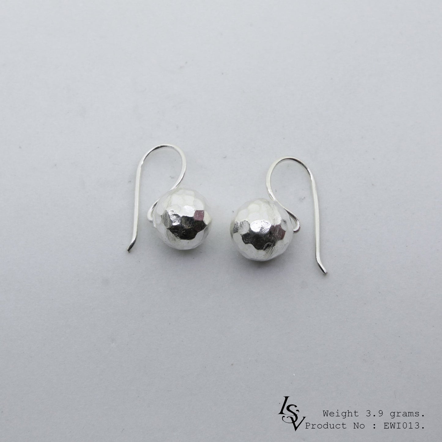 Level up your look with 98% pure white ball silver earrings.
