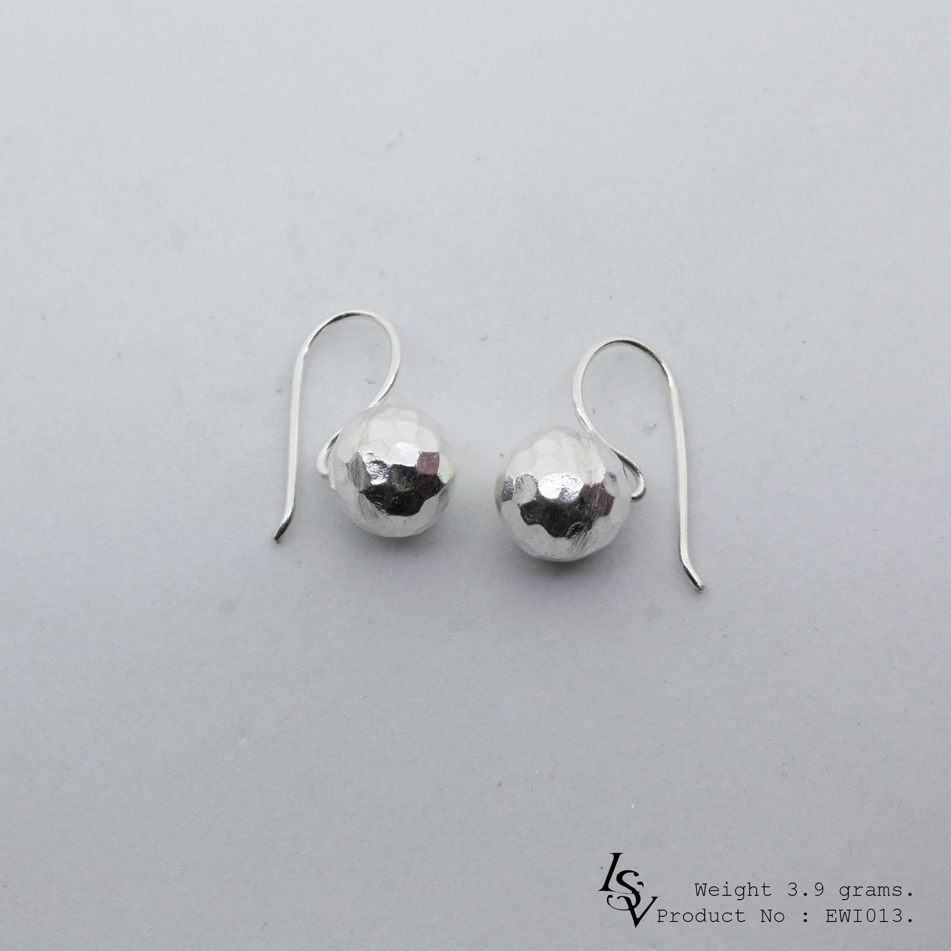 Level up your look with 98% pure white ball silver earrings.