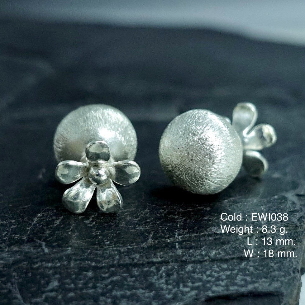 You won’t believe the shine on these handmade ball silver earrings.
