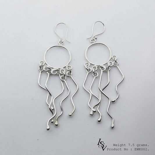 Artisan-made 98% pure silver: Shop white line silver earrings.
