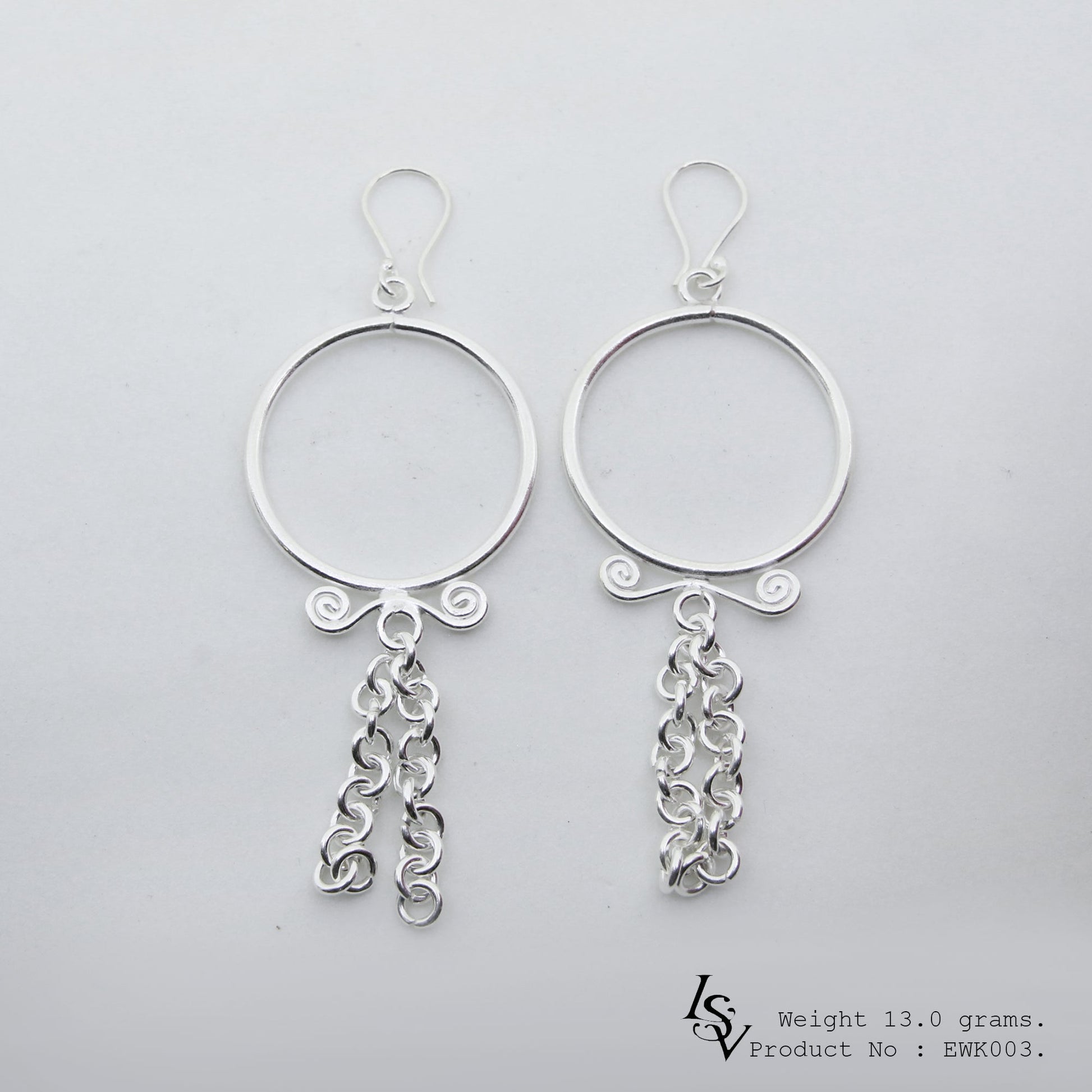 The sleekest look of the season: Handmade white line silver earrings.