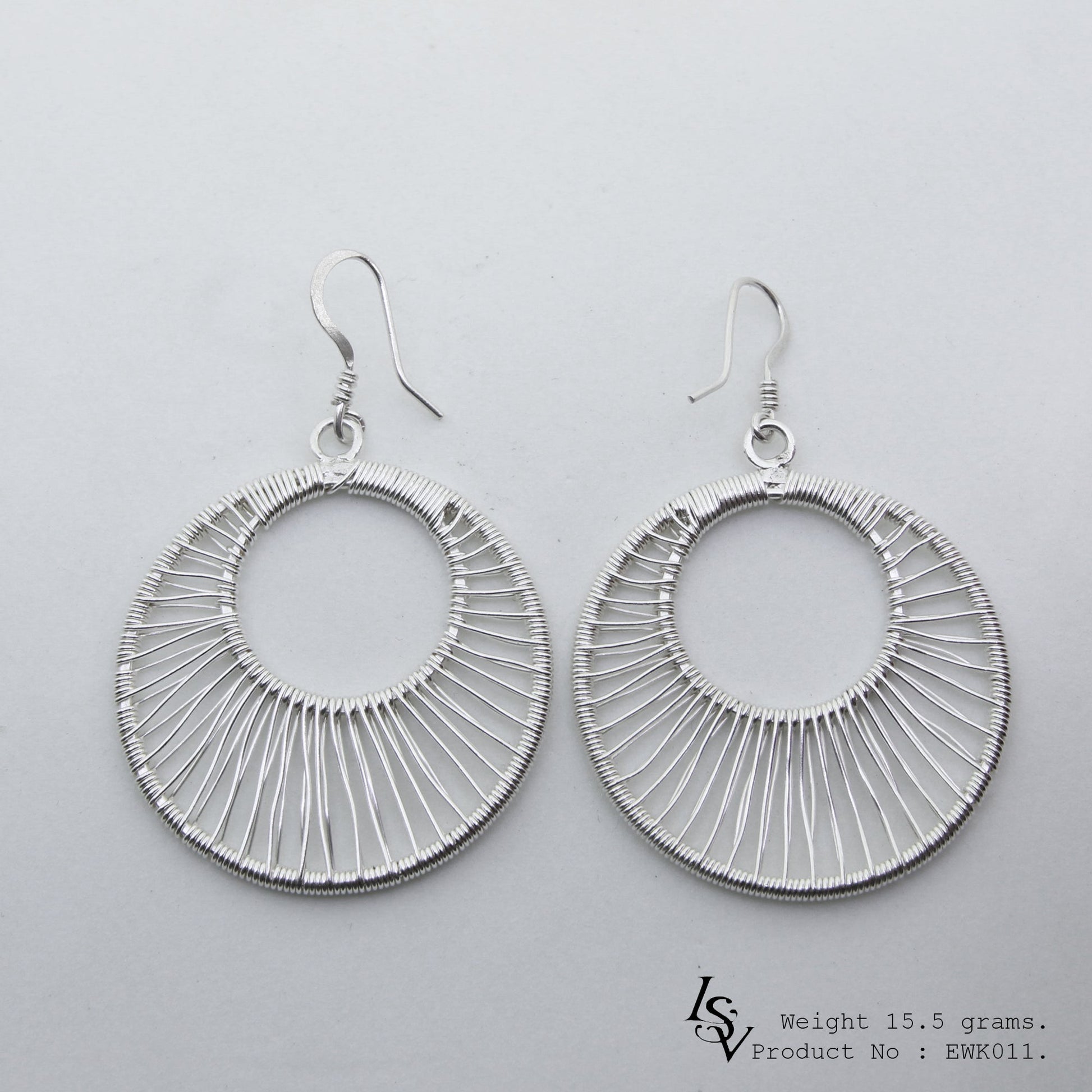 Elevate your everyday style with these white line silver earrings.