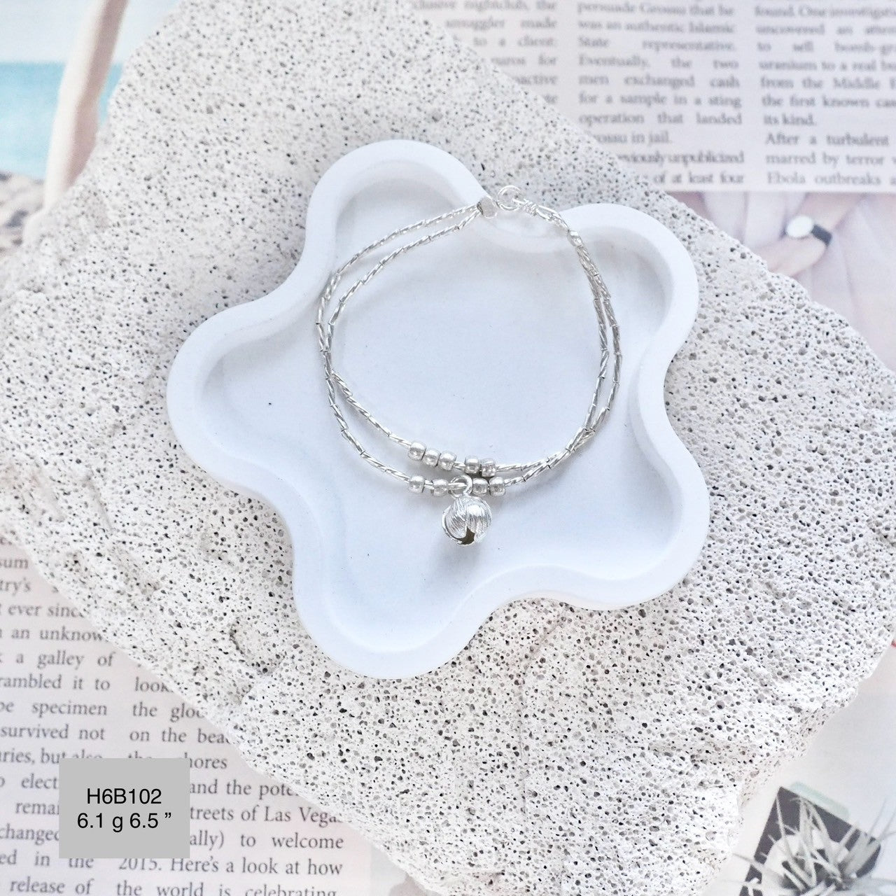 Pure luxury: Experience the glow of our 98% silver bracelet.