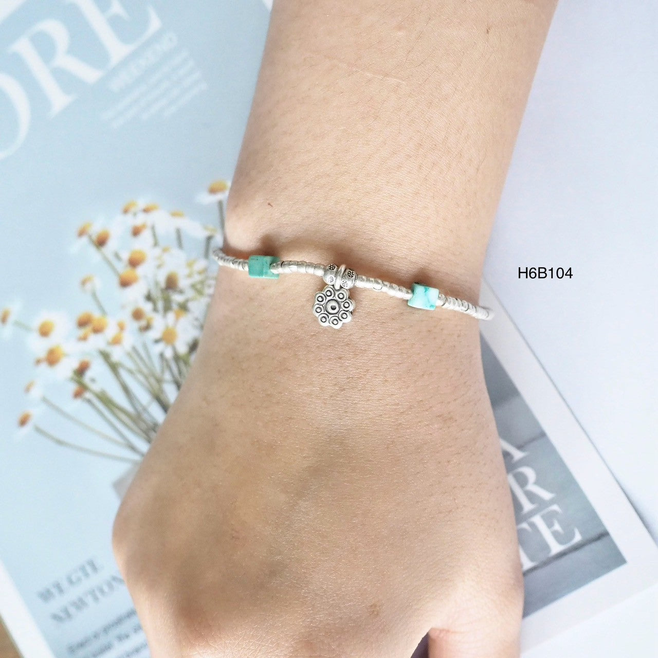 Elevate your wrist game with this high-purity silver bracelet.