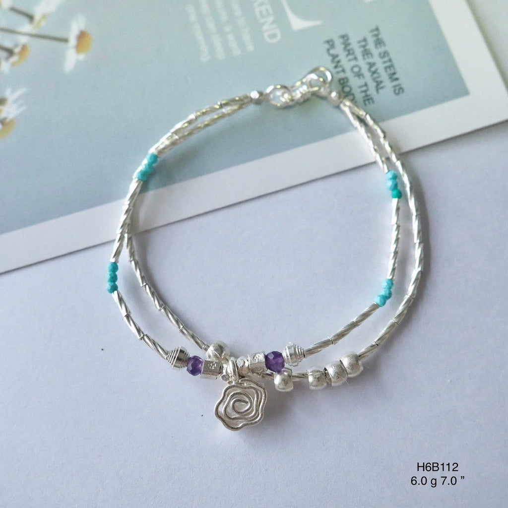 The secret to a perfect outfit? This silver bracelet.