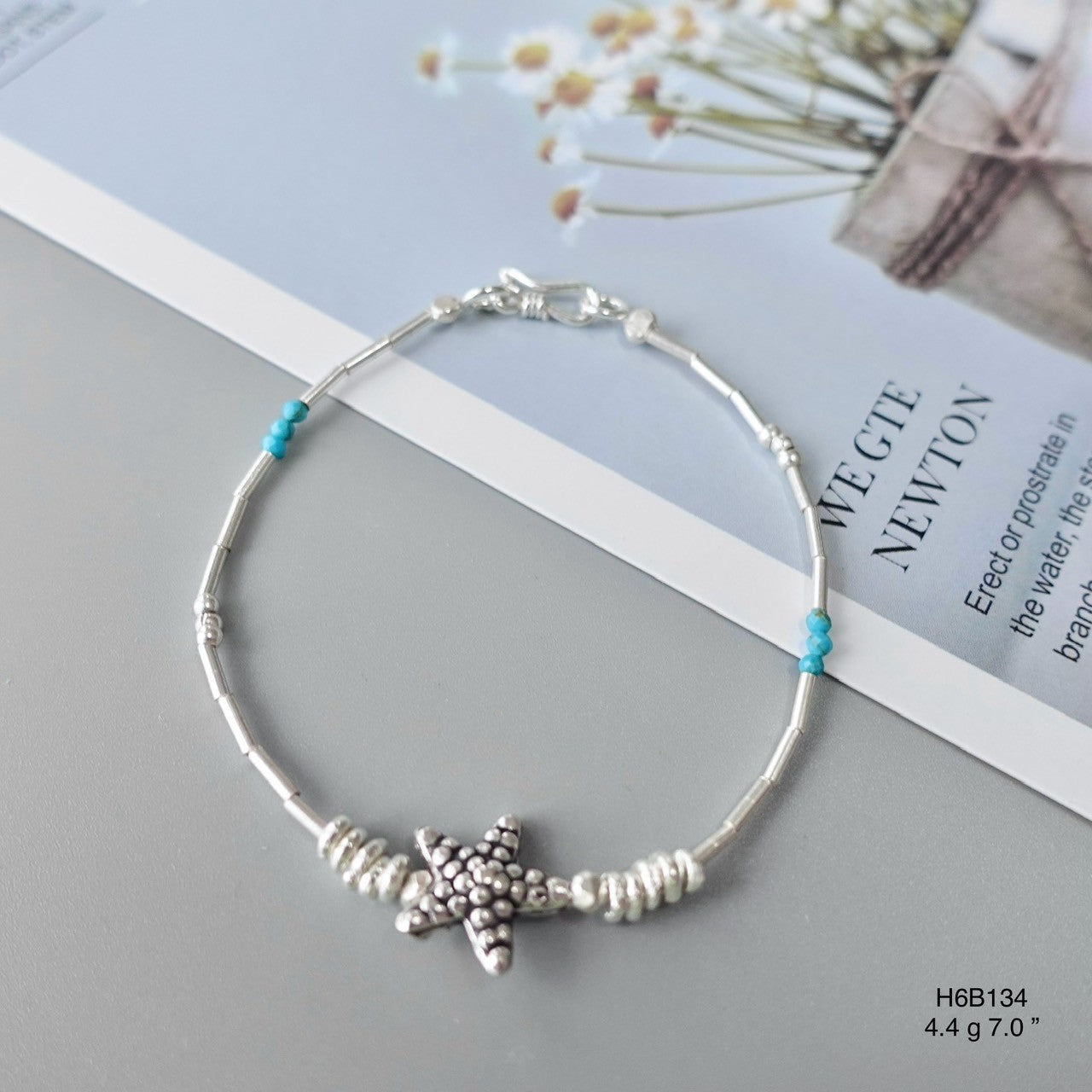 Effortless elegance in a single 98% silver bracelet.