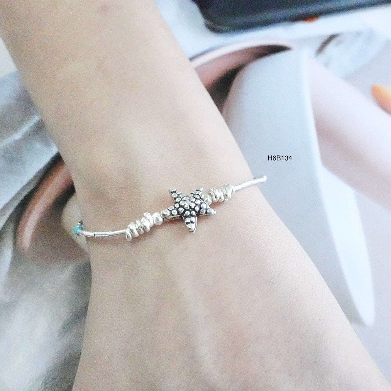 Effortless elegance in a single 98% silver bracelet.
