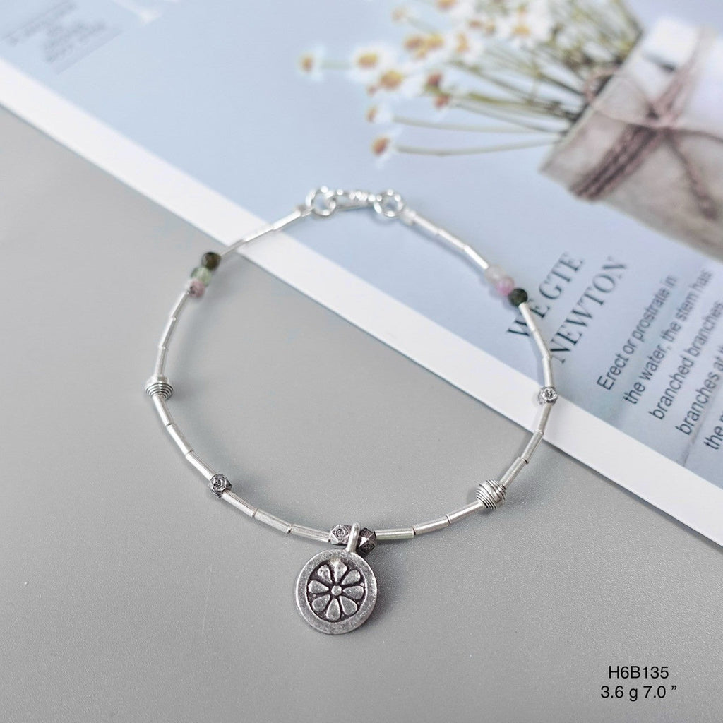 Minimalist vibes with this high-purity silver bracelet.