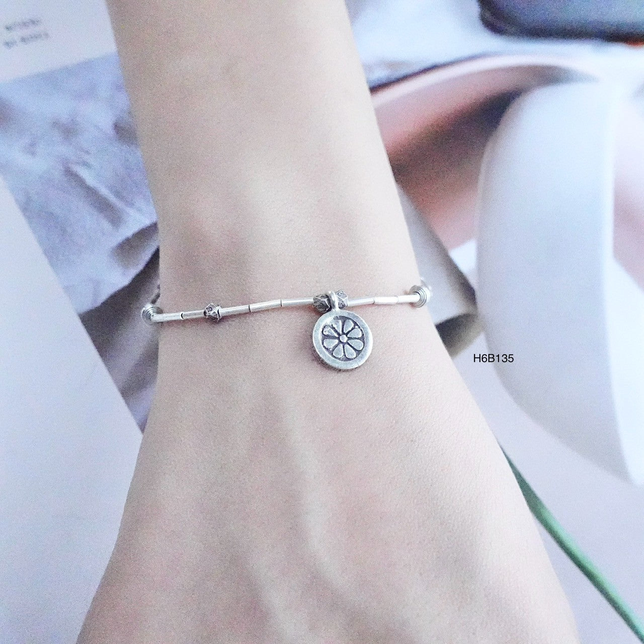 Minimalist vibes with this high-purity silver bracelet.