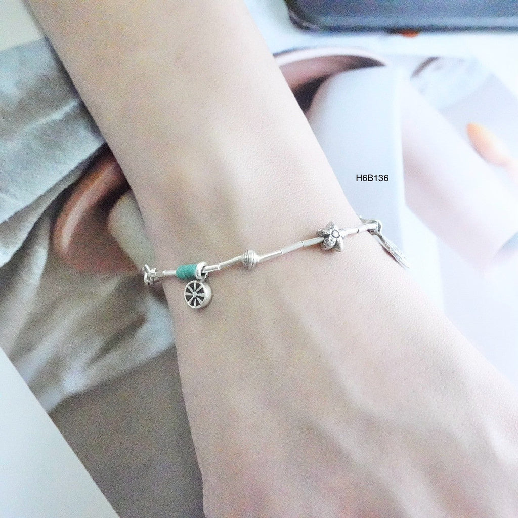 Make a statement with our handcrafted silver bracelet.