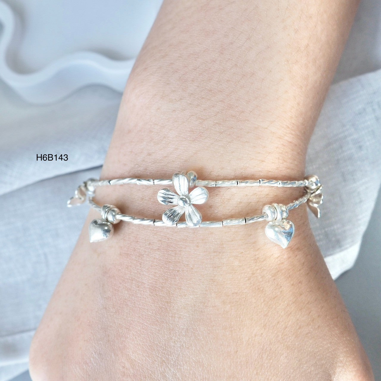 Click for 98% silver bracelet magic.
