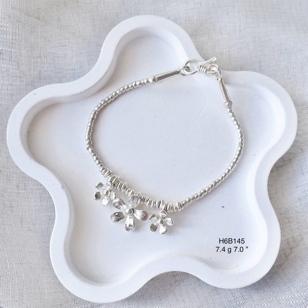 Modern luxury, one silver bracelet at a time.