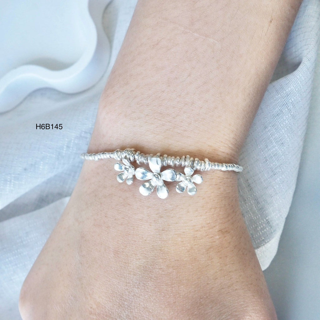 Modern luxury, one silver bracelet at a time.