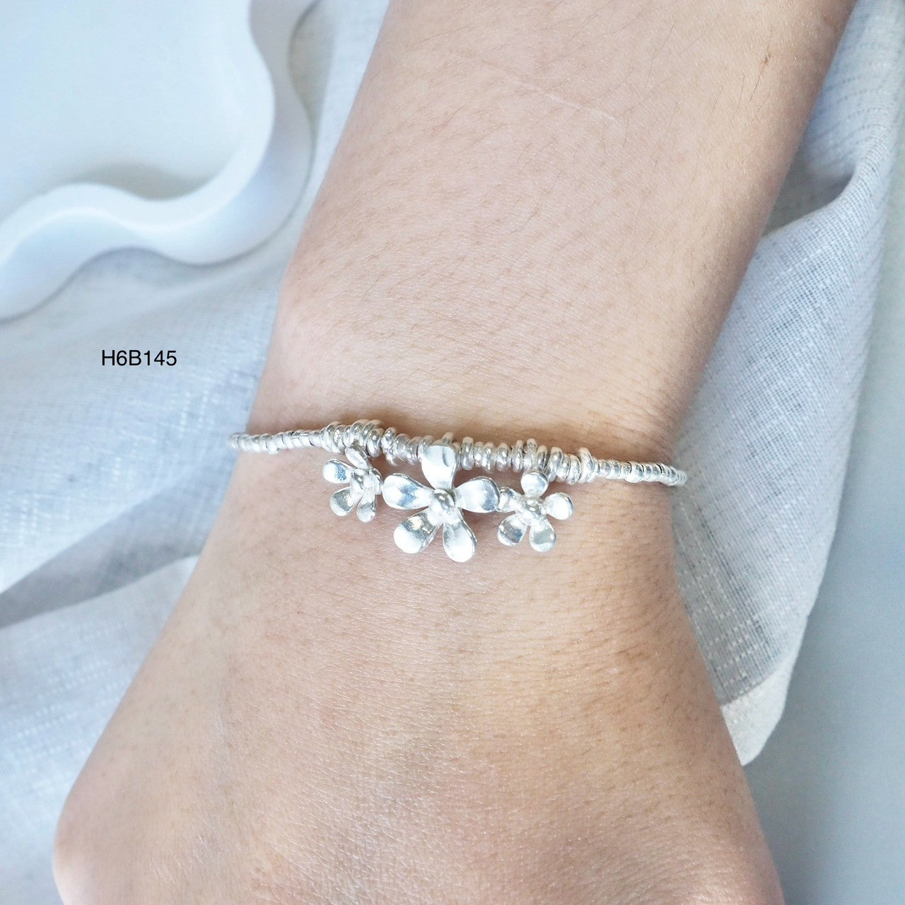 Modern luxury, one silver bracelet at a time.